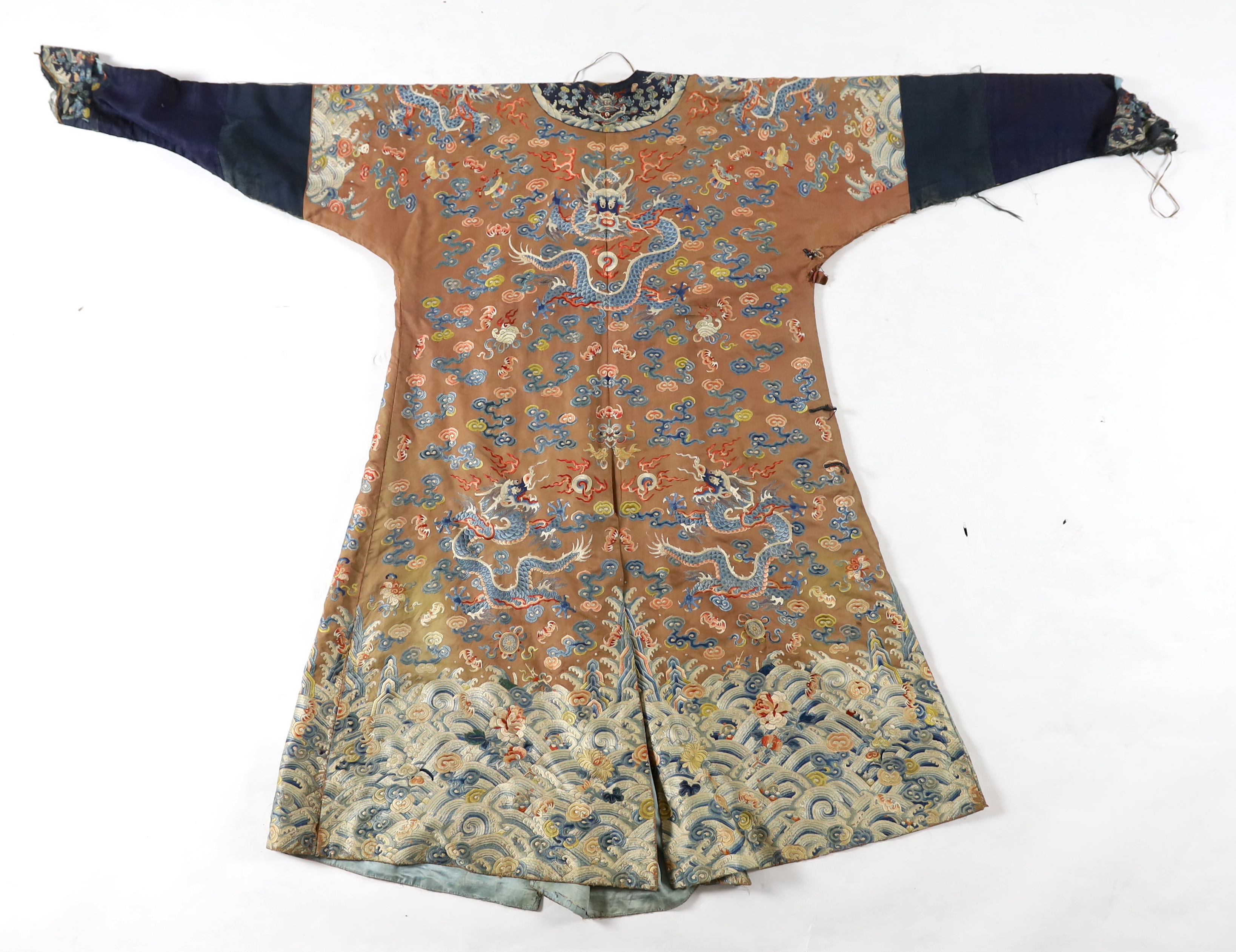 A Chinese chestnut-ground ‘nine dragon’ robe, jifu, 19th century, tears and losses